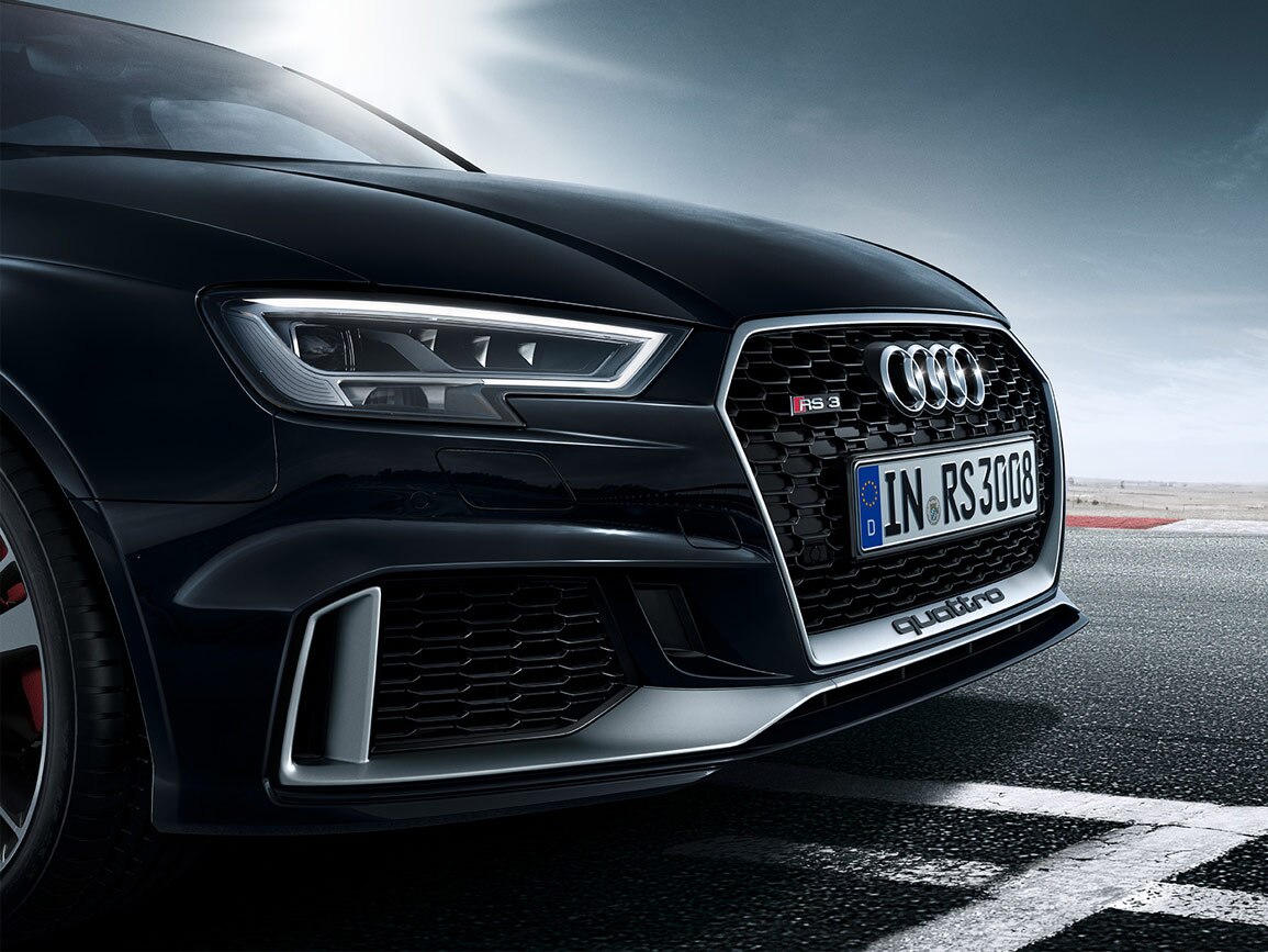 The Audi RS 3 Saloon features large air intakes below the headlights