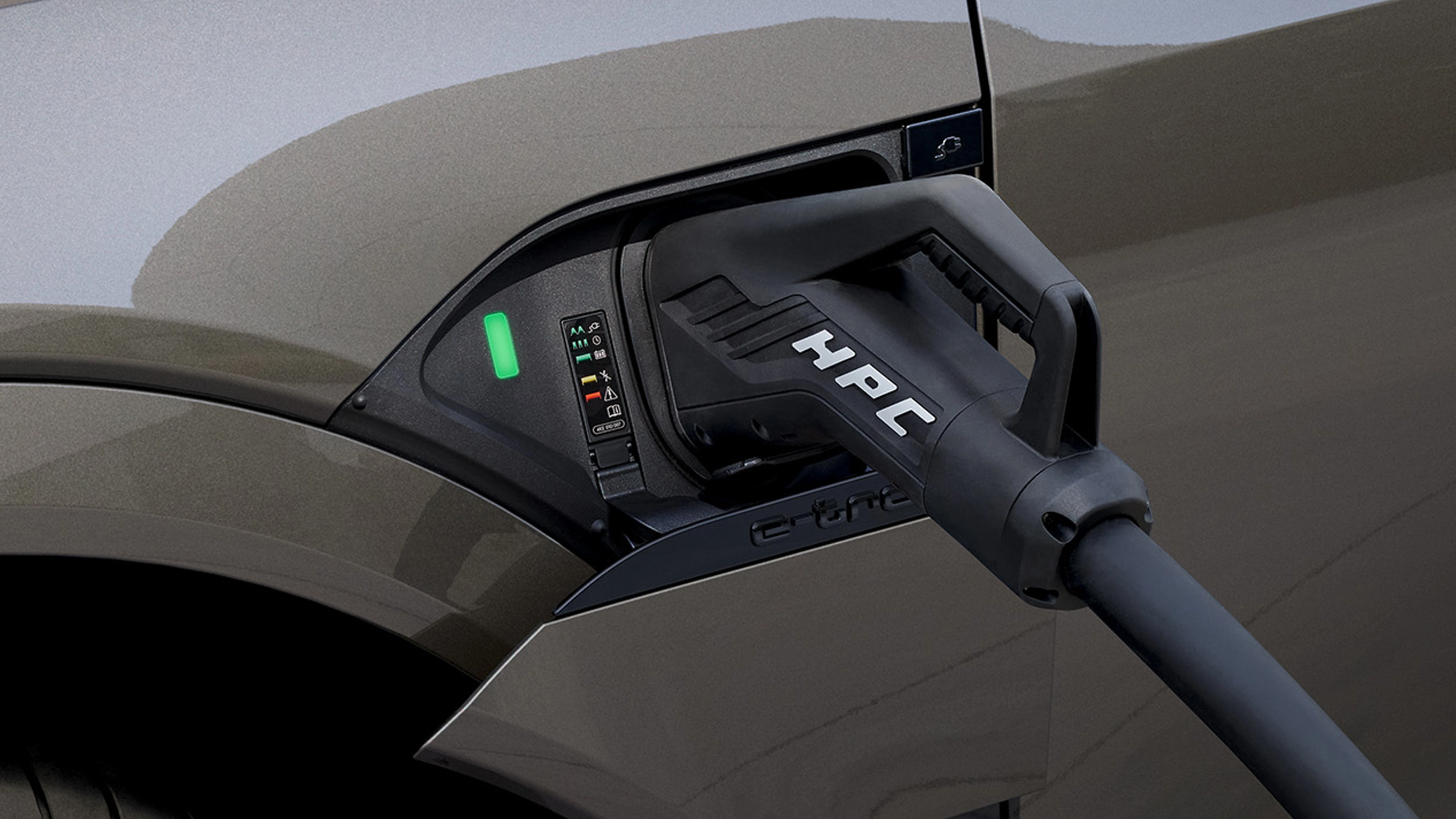 Close up of Audi Q8 e-tron being charged by HPC EV charger