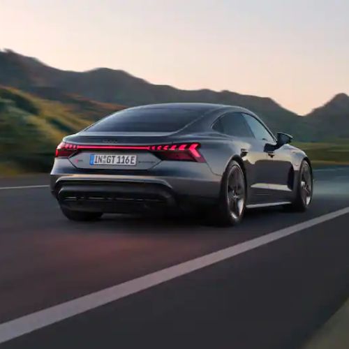 Used Audi Cars. Audi RS e-tron GT driving along a road.