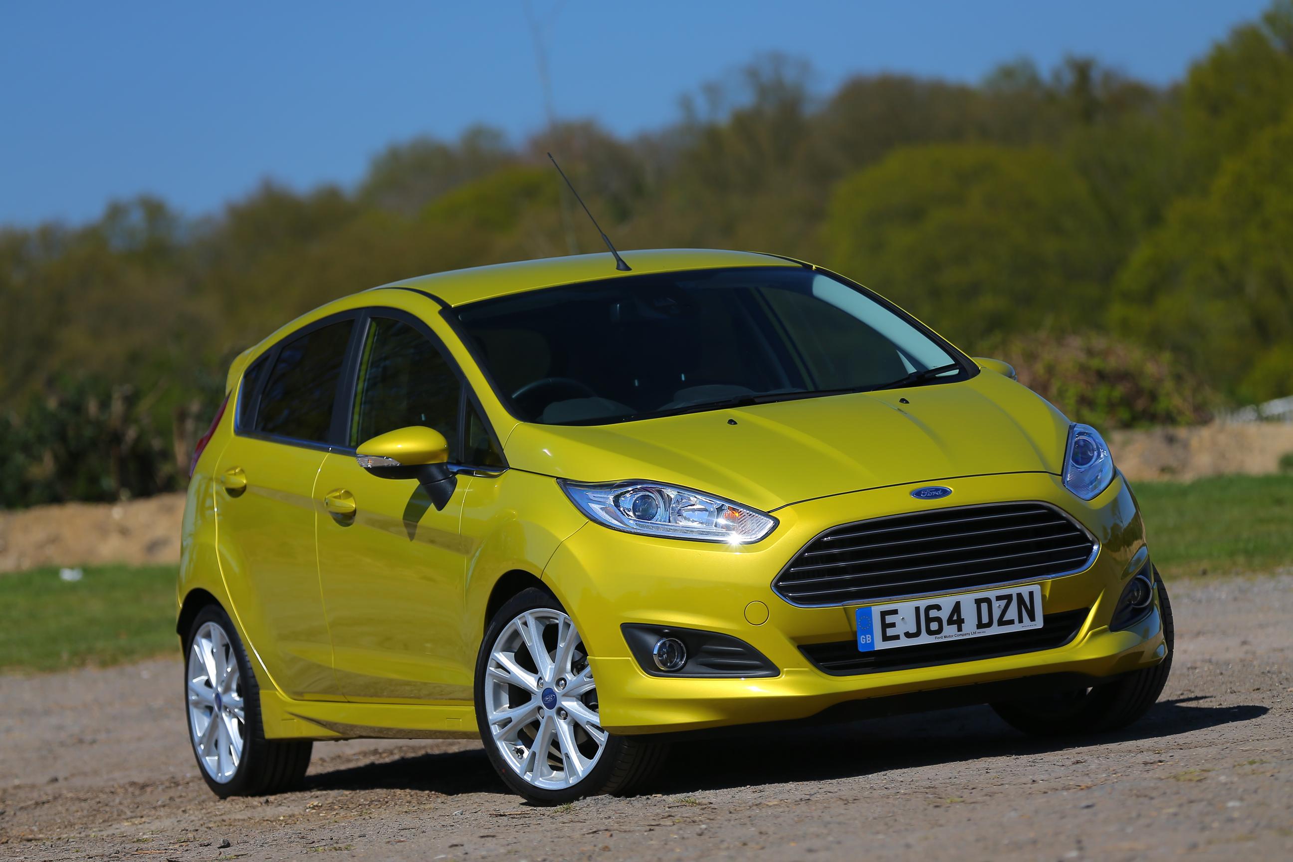 Best First Cars for young driver Ford Fiesta Image. Featuring a gold Ford fiesta front on shot.