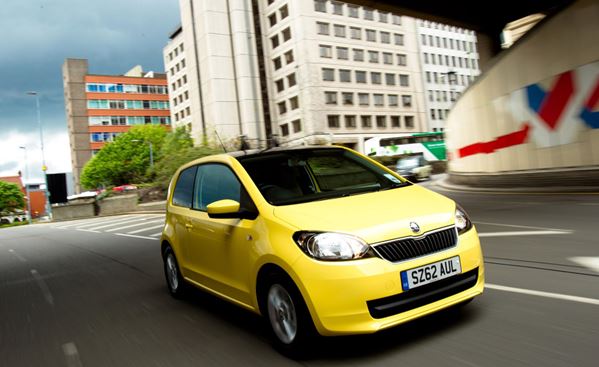 Best First Cars for young driver Ford Fiesta Image. Featuring a Yellow Skoda Citigo front on shot.