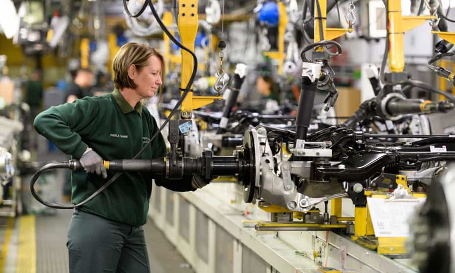 A worker in Jaguar Land Rover's factory