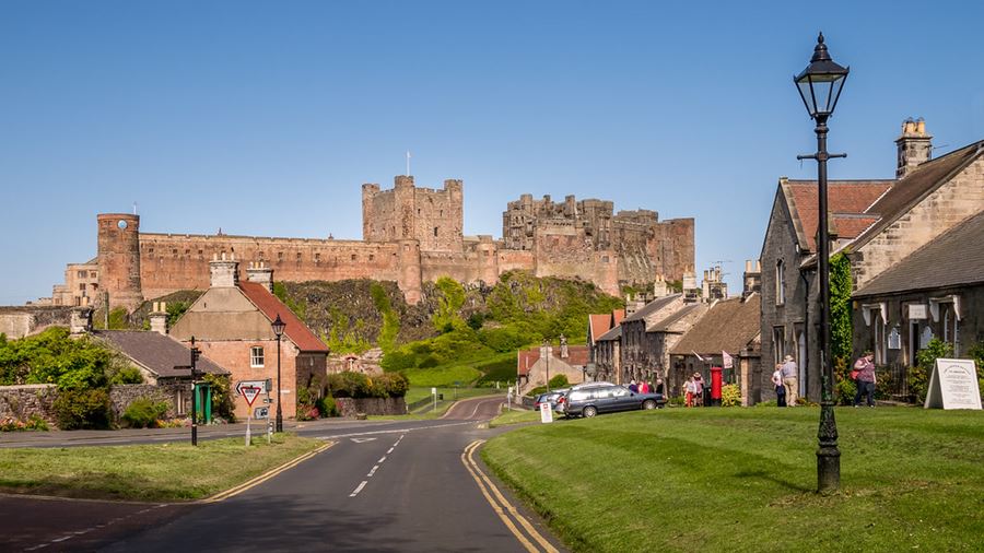 Bamburgh's Front Street, with Bamburgh Castle in the background