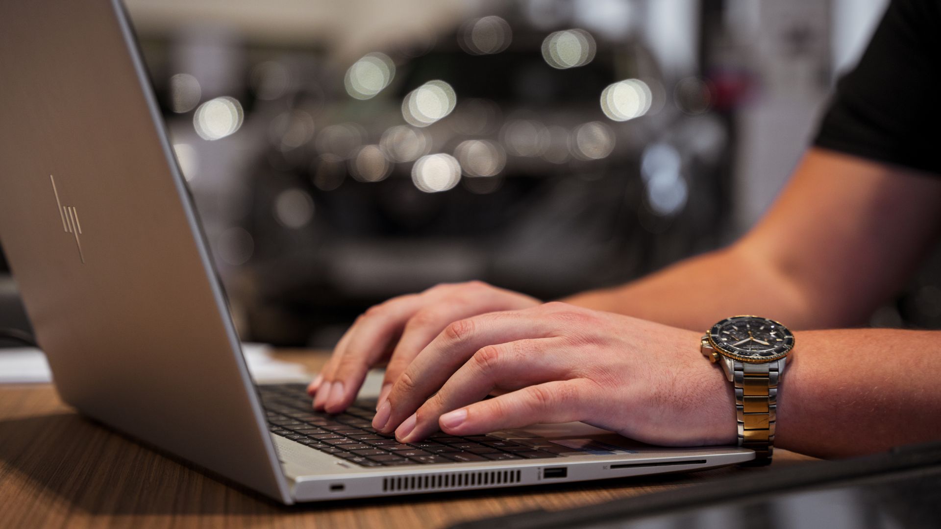 Woman browsing online for cars from Lookers