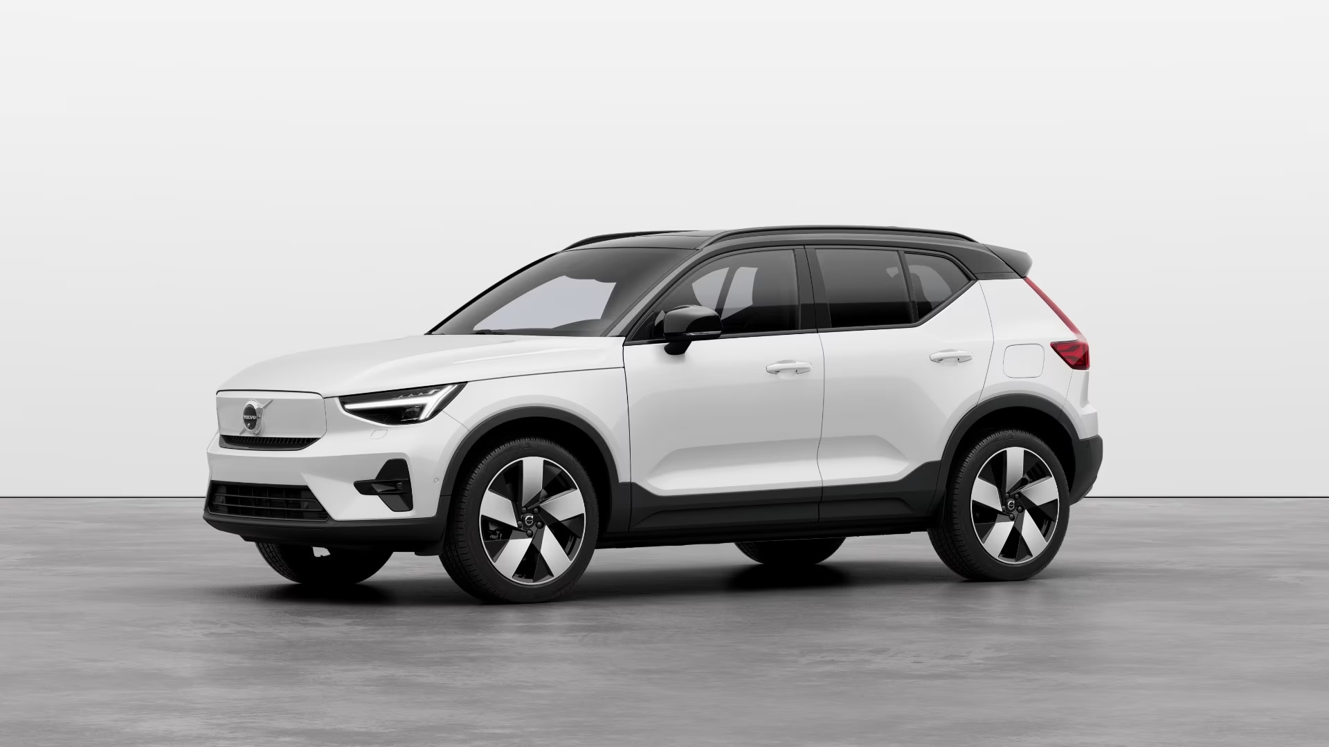 White Volvo XC40 Recharge parked front three quarters