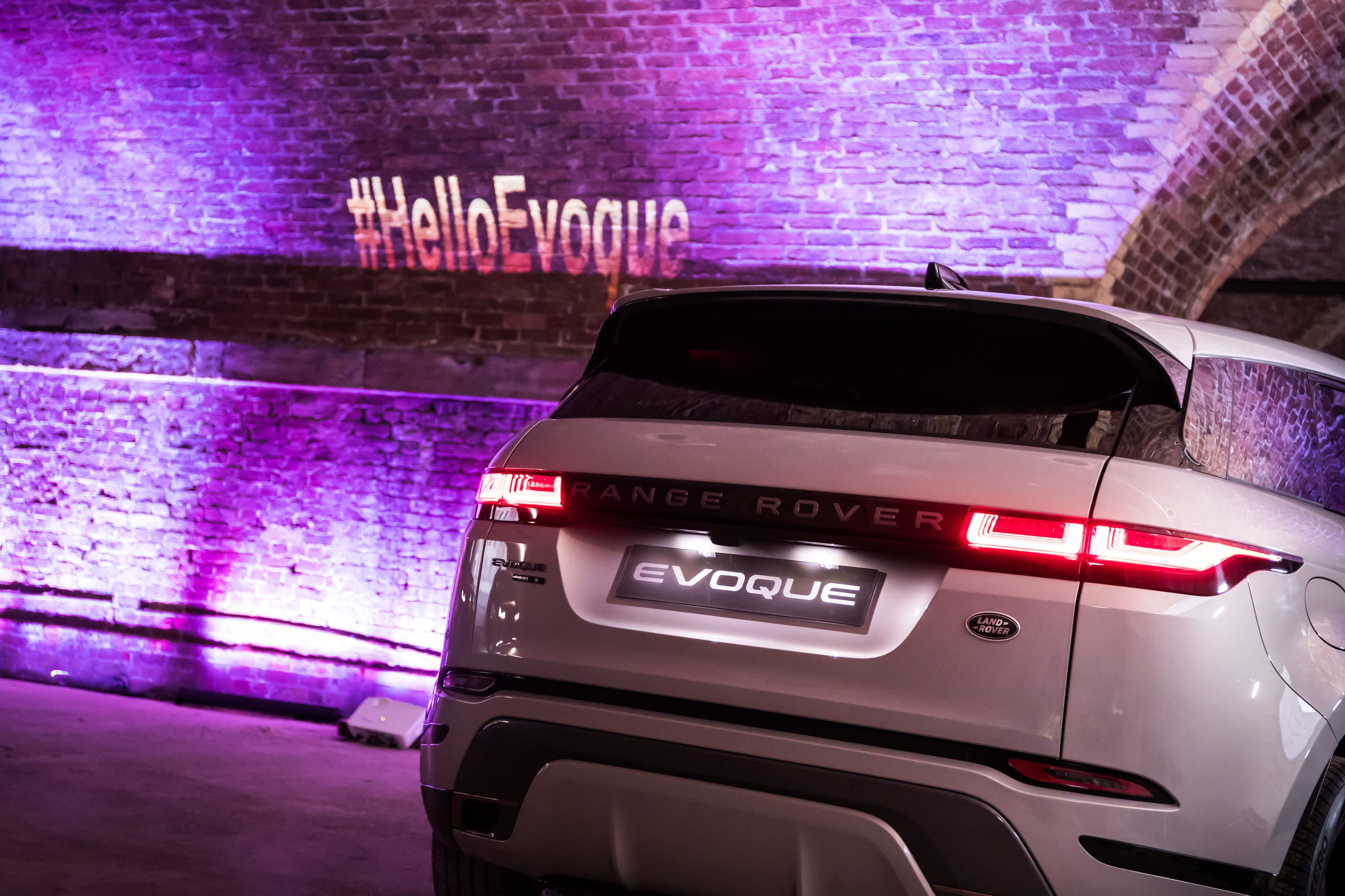 The new Range Rover Evoque beneath an illuminated tunnel during the demo event